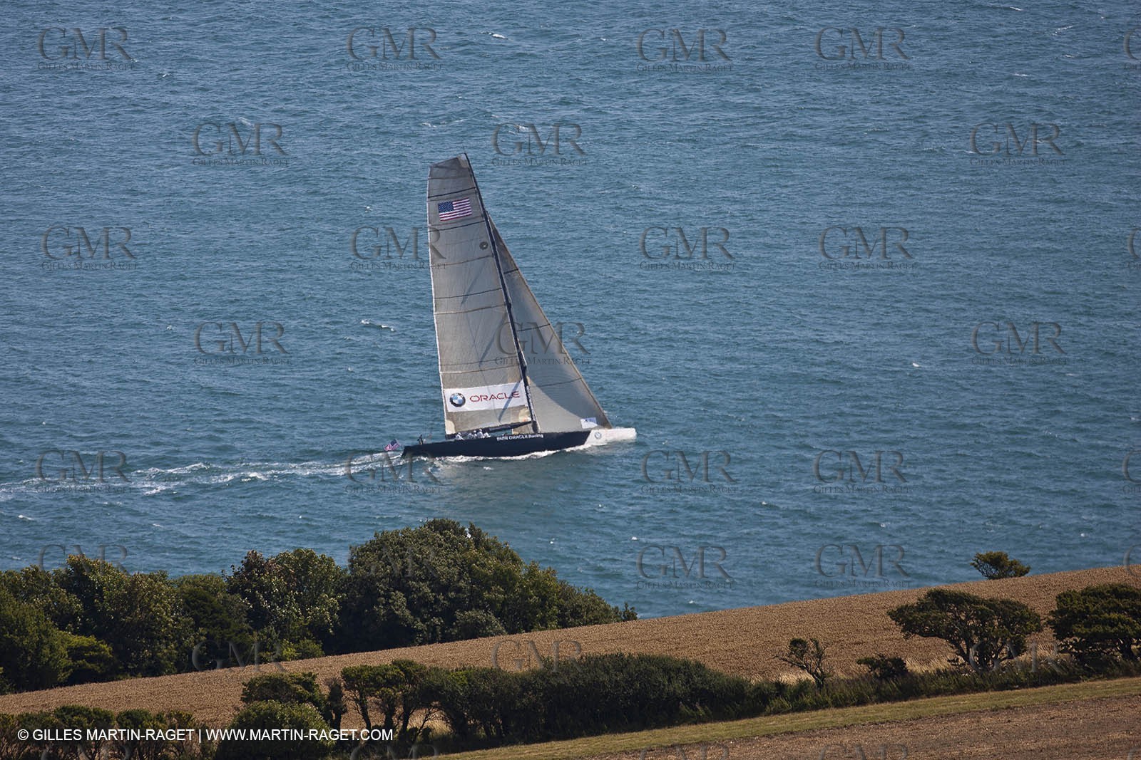 05 08 2010 - Cowes (UK, IOW) - The 1851 Cup -  BMW ORACLE Racing -  - Round The Island Race - Passing Ste Catherine Lighthouse.