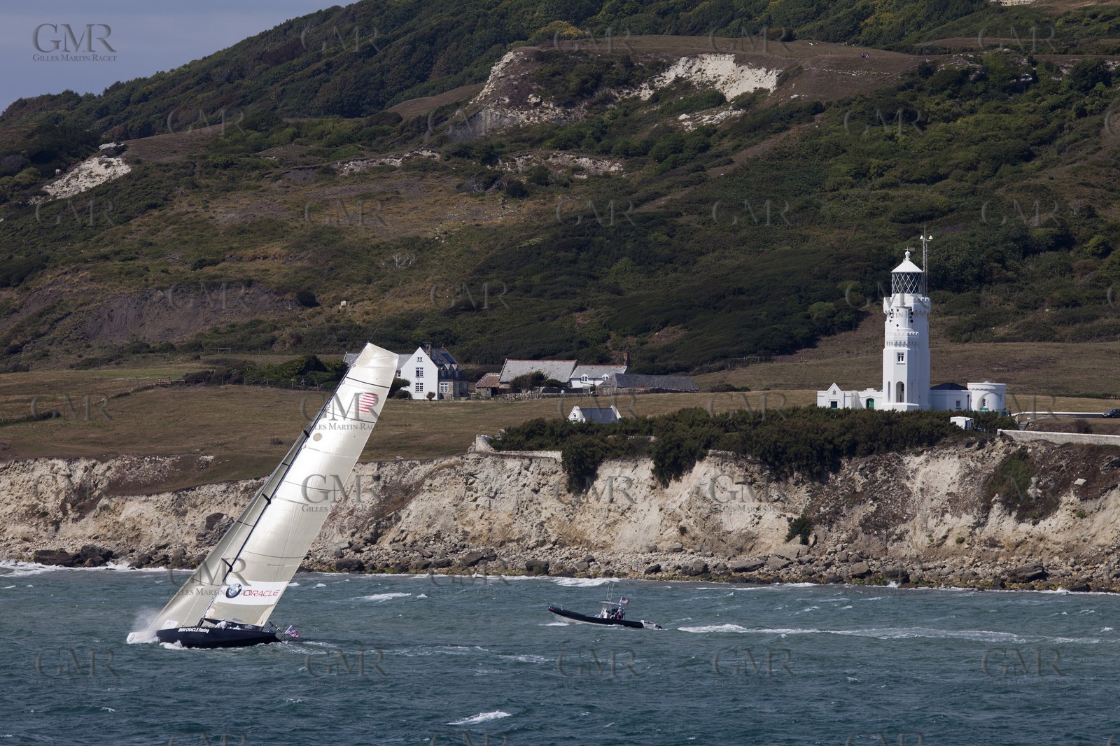 05 08 2010 - Cowes (UK, IOW) - The 1851 Cup -  BMW ORACLE Racing -  - Round The Island Race - Passing Ste Catherine Lighthouse.