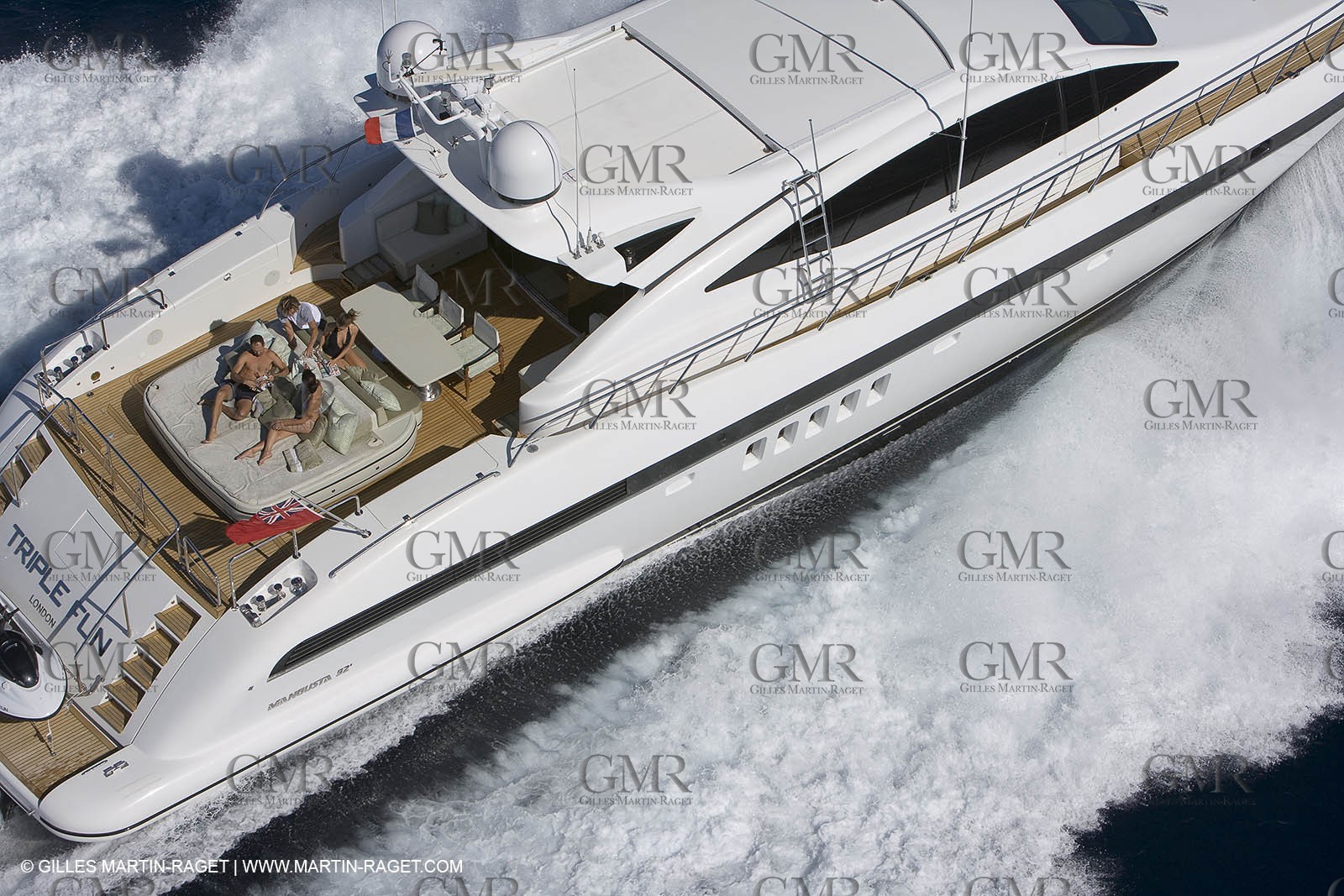 06 09 2007 - Saint Tropez (FRA, 83) - Superyachts - Motoryachts - Mangusta 92 Triple Fun in Saint Tropez - Mooring at Club 55 at Pampelonne Beach