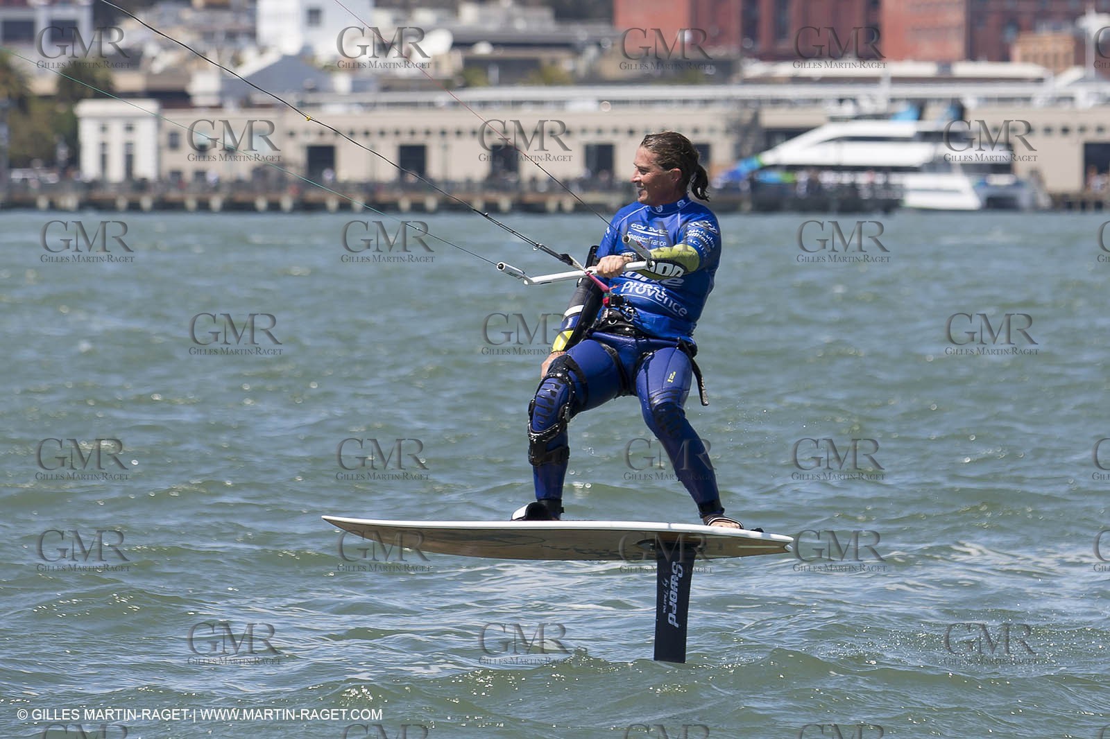 20 08 2013 - San Francisco (USA,CA) - French speed kit surfer Alex Caizergues sails with  Red Bull Youth America's Cup tem Next World Energy