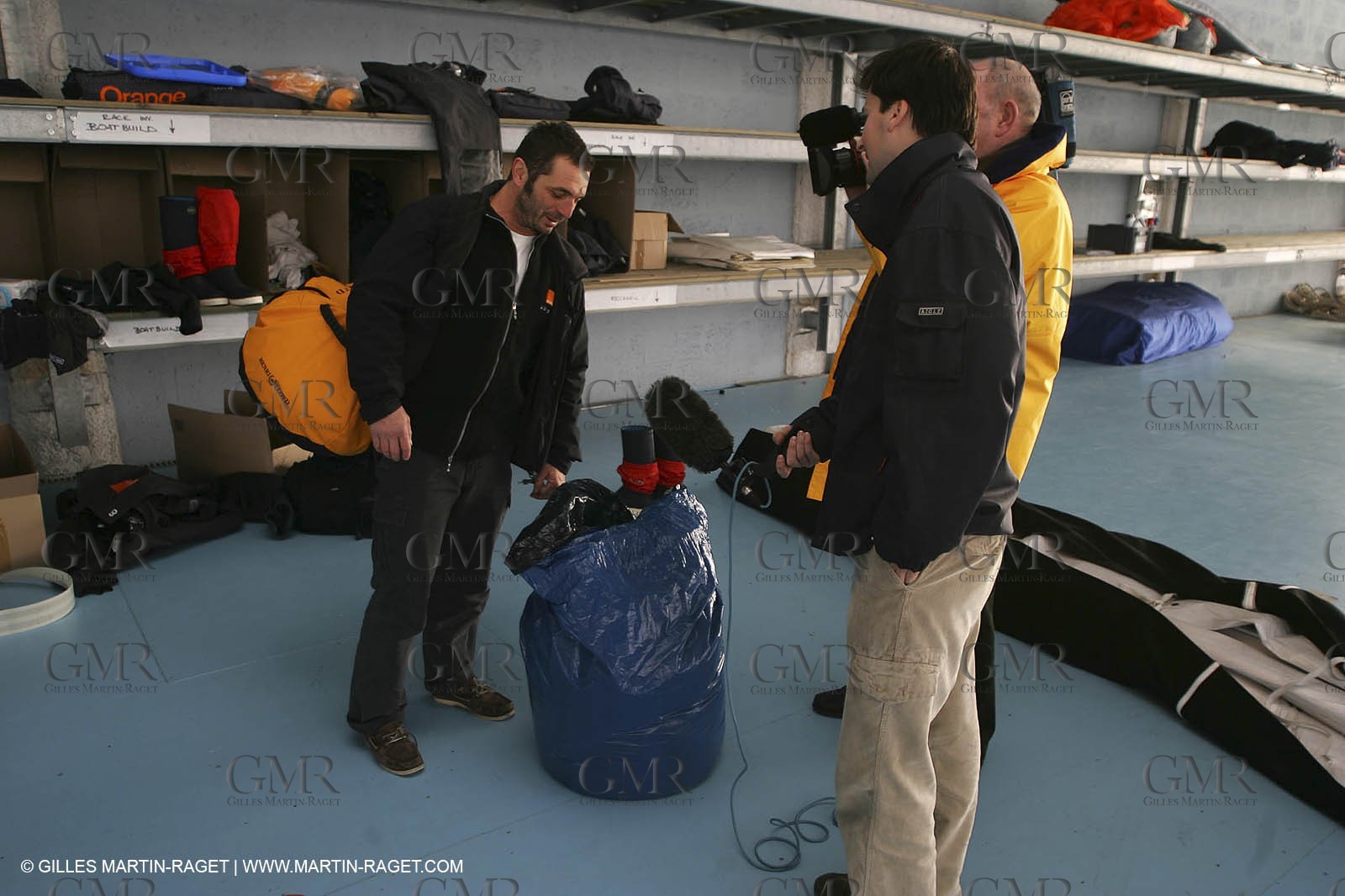 Orange II-2005 Jules Verne Trophy-Start from Lorient-Yves Leblevec preparing his bag before the start