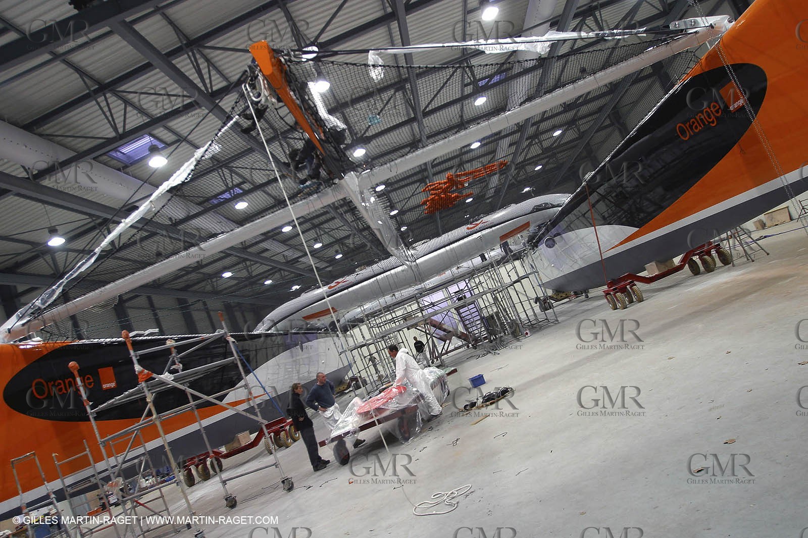 Vannes - Multiplast Boatyard - Orange II going out of the shed
