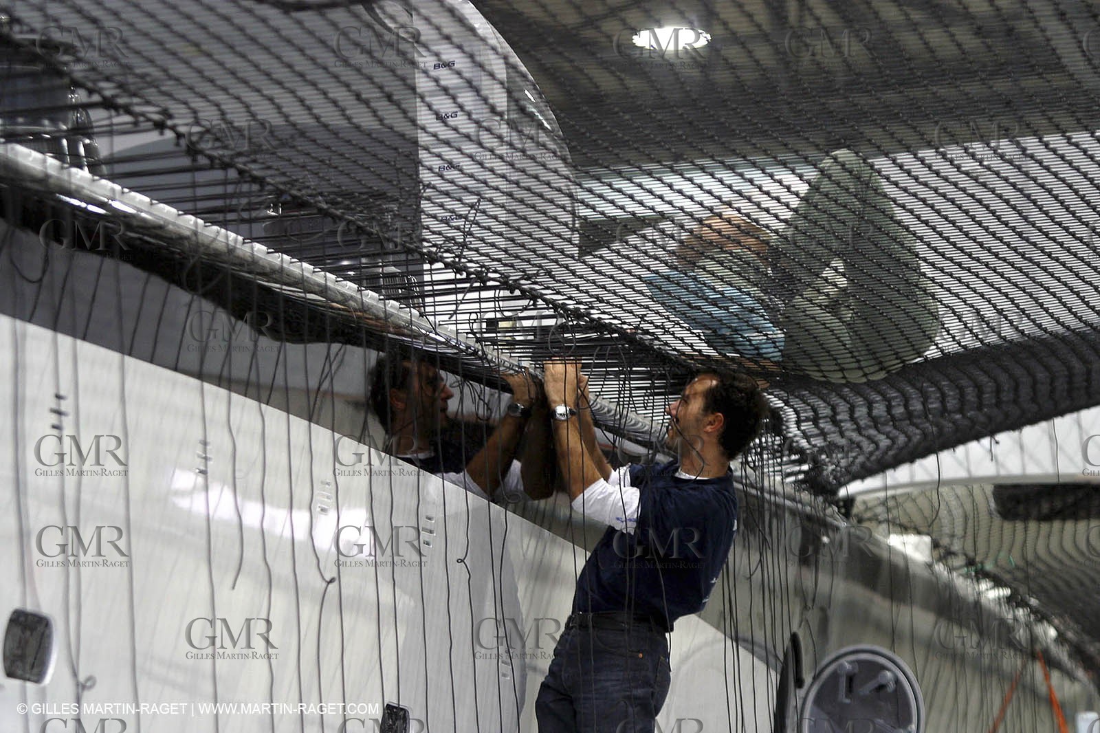 Vannes - Multiplast Boatyard - Orange II going out of the shed