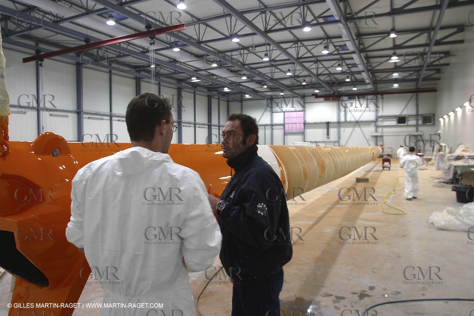 Vannes - Multiplast Boatyard - Orange II going out of the shed