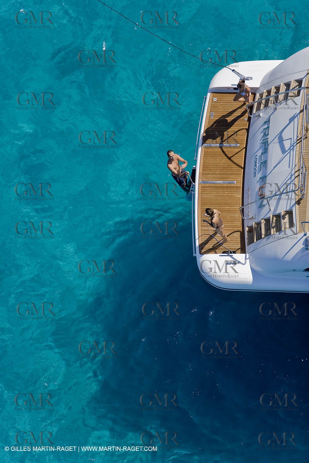 06 09 2007 - Saint Tropez (FRA, 83) - Superyachts - Motoryachts - Mangusta 92 Triple Fun in Saint Tropez - Mooring at Club 55 at Pampelonne Beach