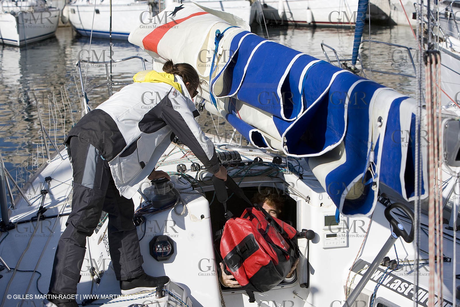 28 09 2007 - Marseille (FRA, 13) - Aigle Marine weather clothing showed in action by salors Marc Emig et Luce Molinier