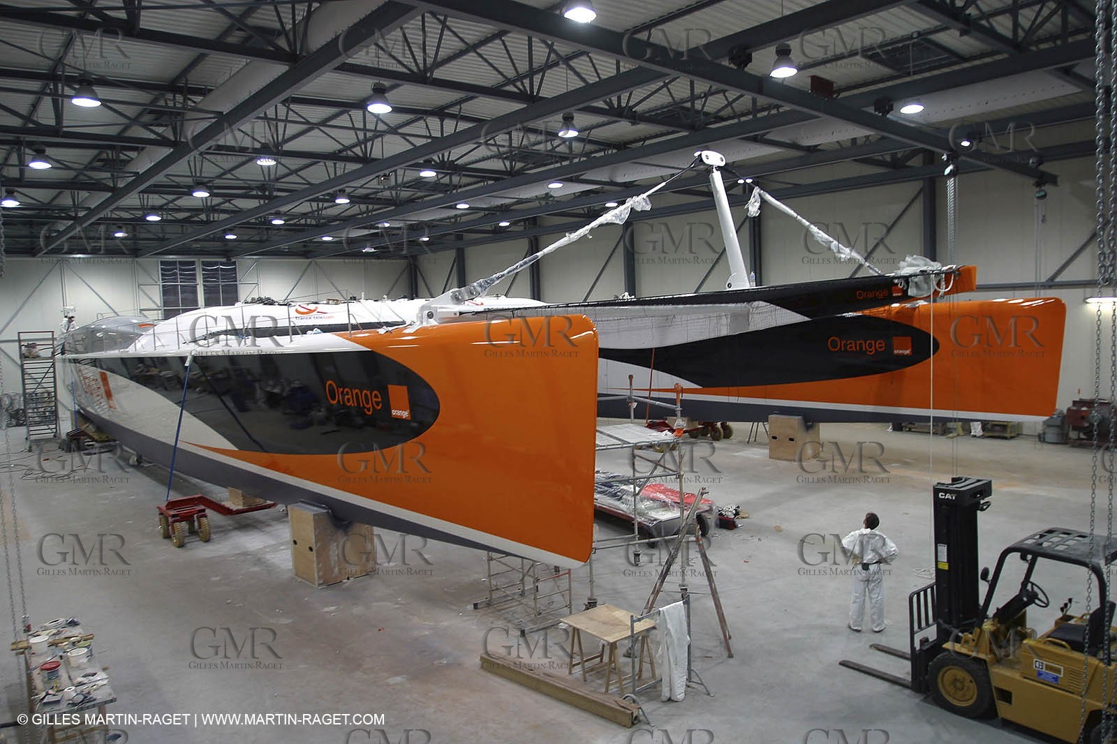 Vannes - Multiplast Boatyard - Orange II going out of the shed