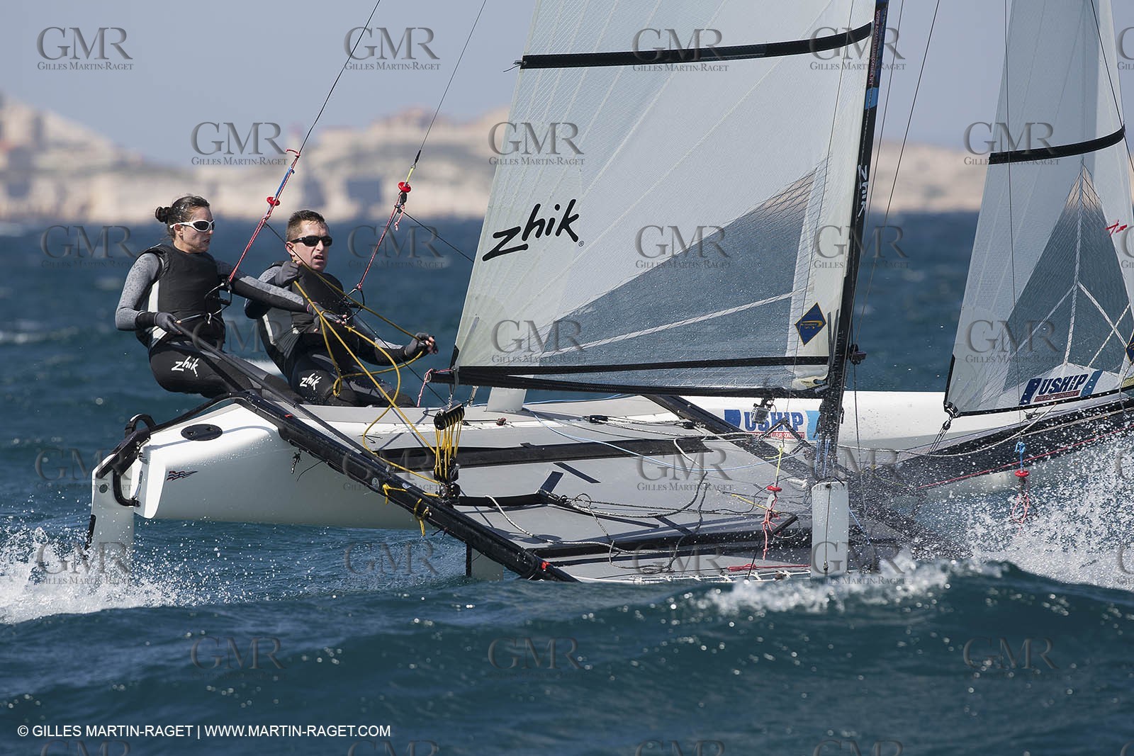 26 03 2013 - Marseille (FRA,13) - Ingrid Petitjean et Olivier backes training on their Nacra 17 in breezy conditions