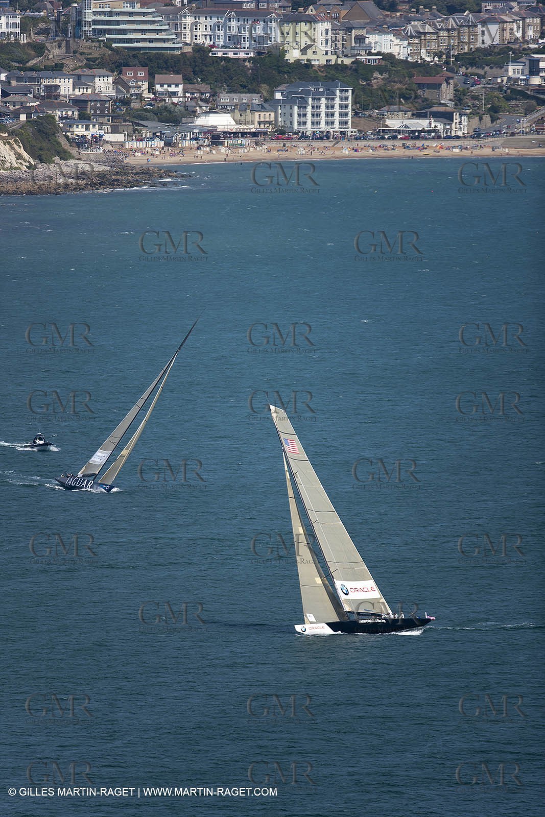05 08 2010 - Cowes (UK, IOW) - The 1851 Cup -  BMW ORACLE Racing -  - Round The Island Race - Passing Ste Catherine Lighthouse.